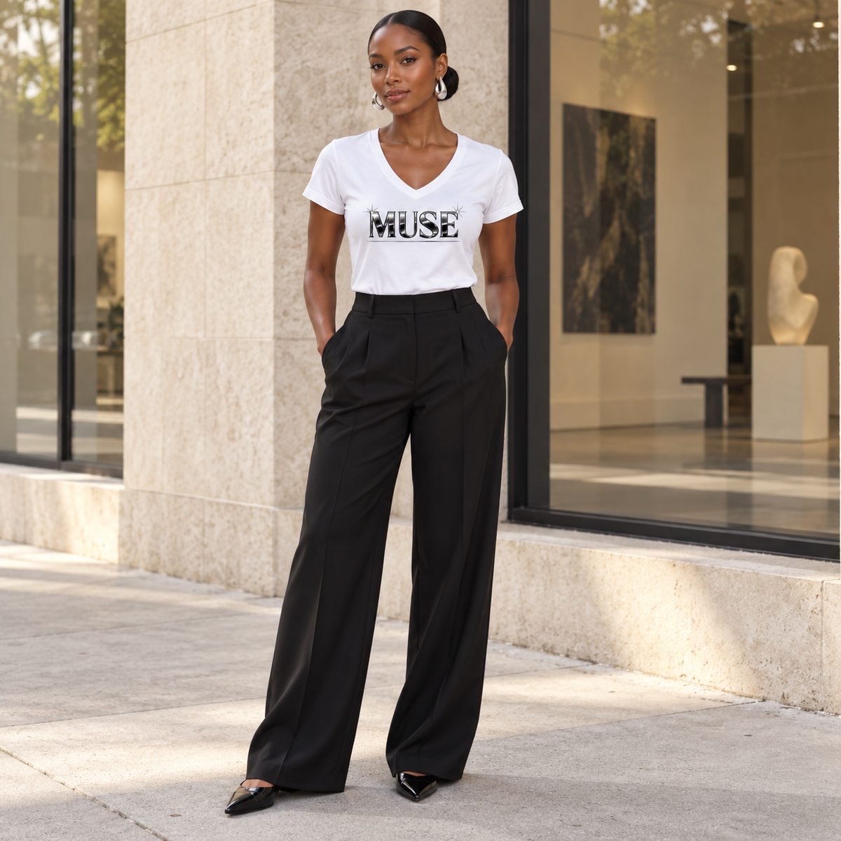 Woman modeling the white Muse V-neck tee