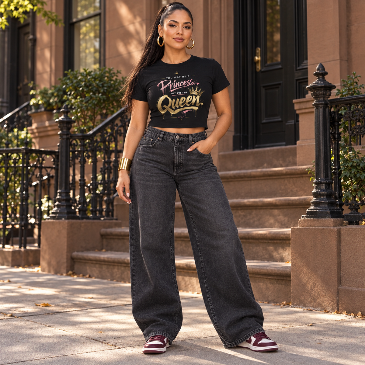 Woman modeling the black Princess but I'm a Queen crop top